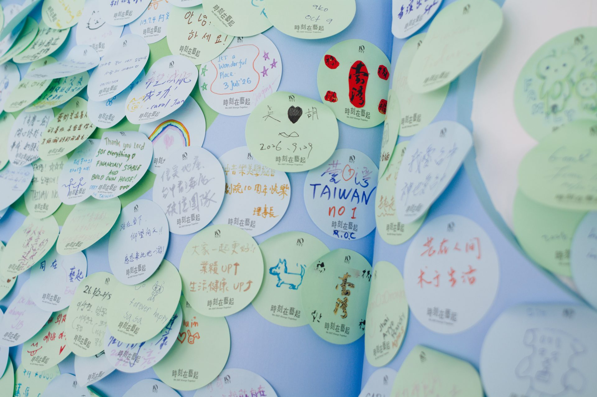 Wall of handwritten wish cards